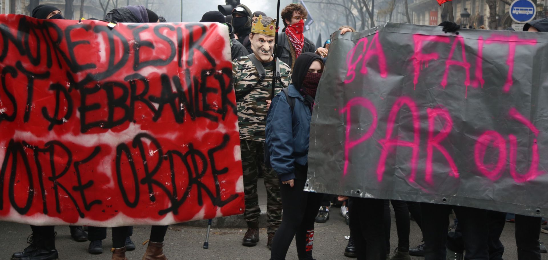 Protesters take to the streets in Paris on March 22, 2018, to rally against French President Emmanuel Macron's economic and labor reforms.