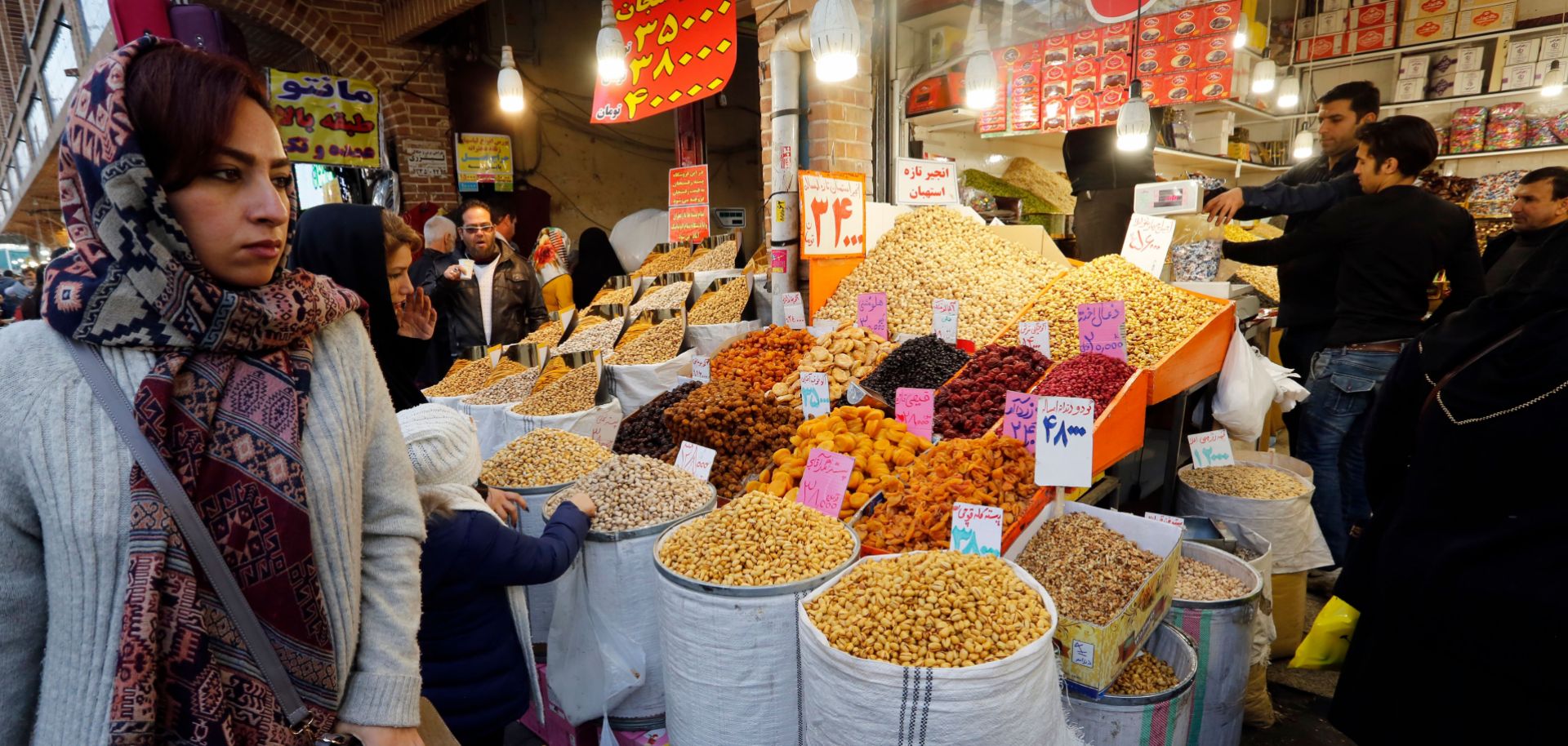 Iranians shop at Tehran's ancient Grand Bazaar.