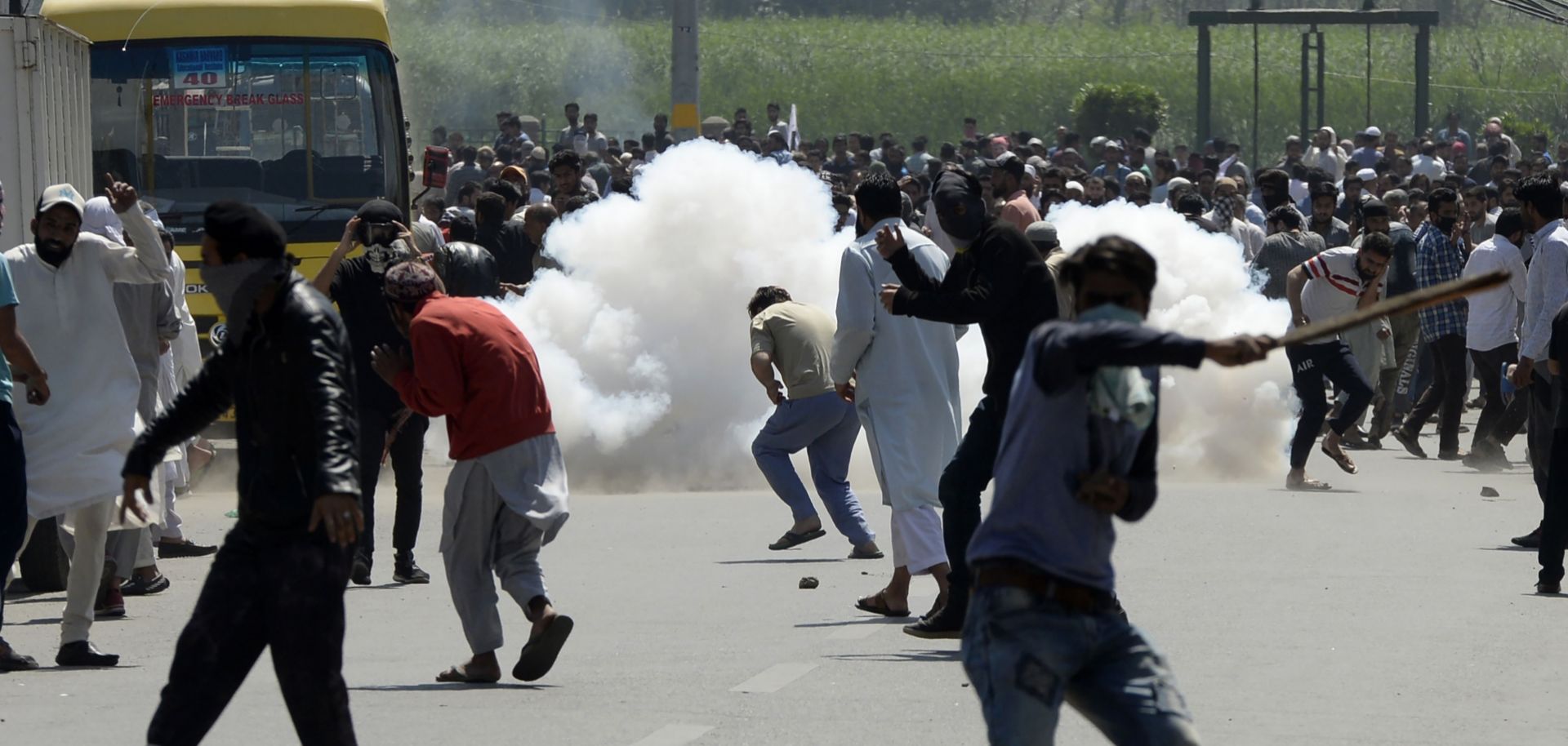 Protesters attending the funeral of a man who was killed during previous clashes with Indian security forces, battle police.