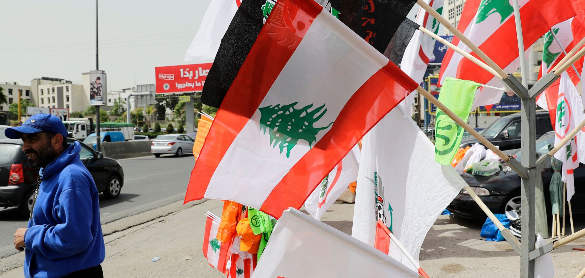 In this photograph from Lebanon, a vendor sells national and party flags near Beirut on May 2, 2018, ahead of parliamentary elections.