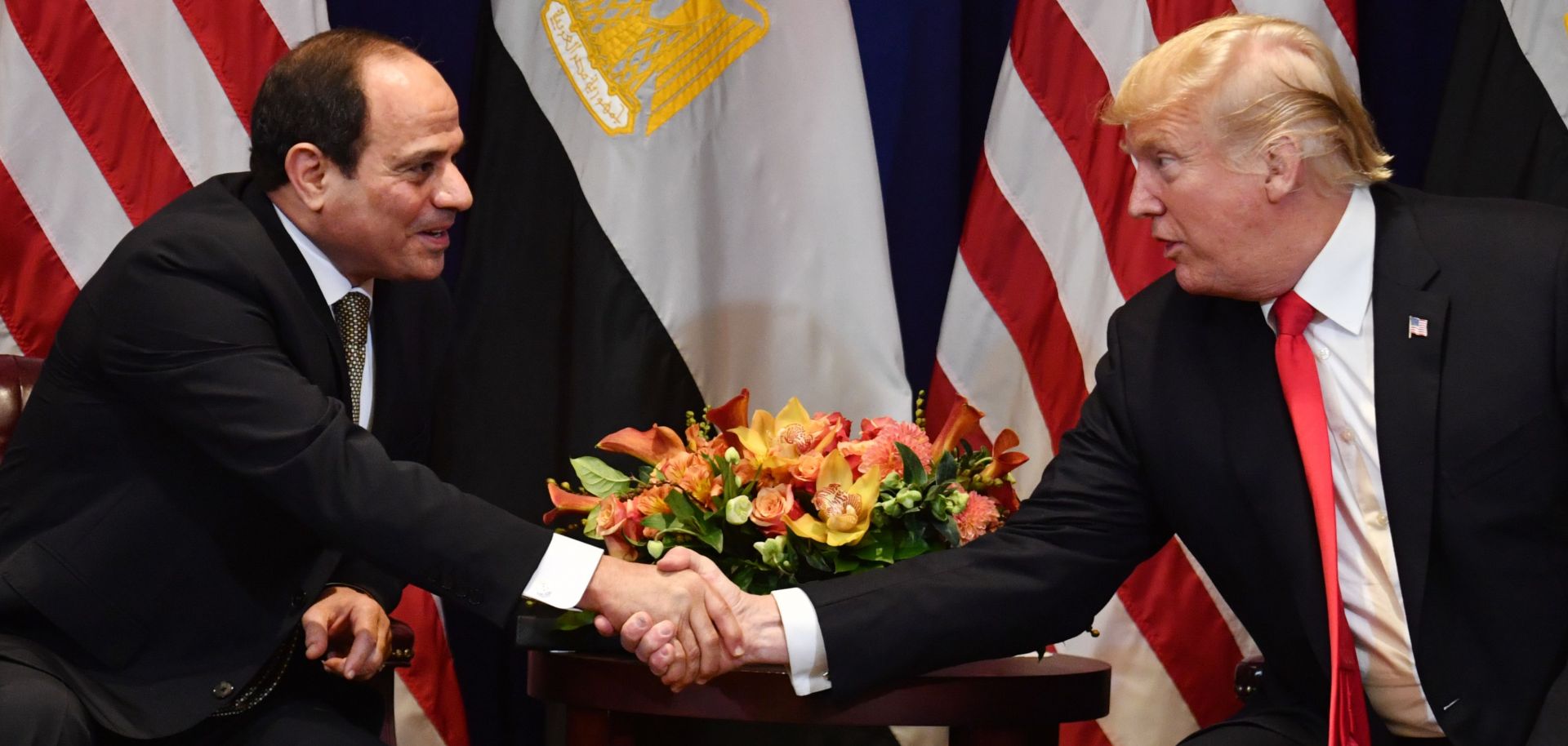 Egyptian President Abdel Fattah al-Sisi (L), shakes hands with U.S. President Donald Trump at the start of a bilateral meeting in New York on Sept. 24, 2018.