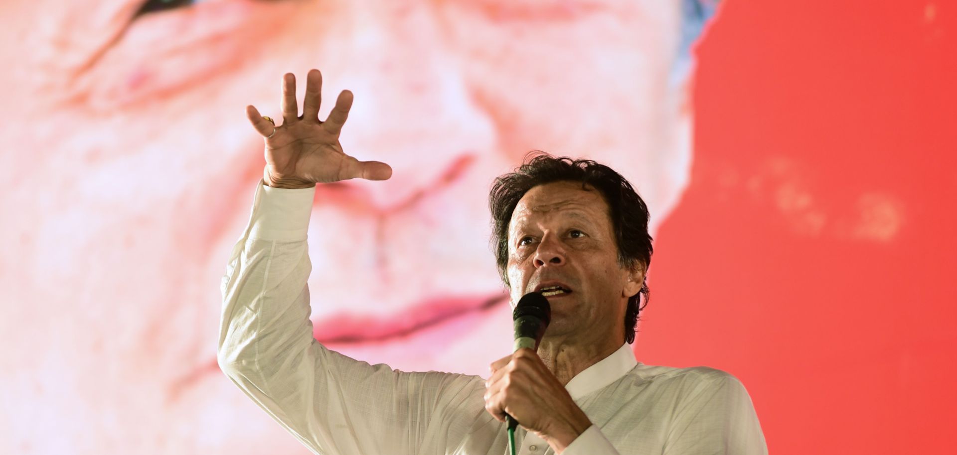 Pakistani cricket star-turned-politician Imran Khan speaks during a campaign rally in July 2018.