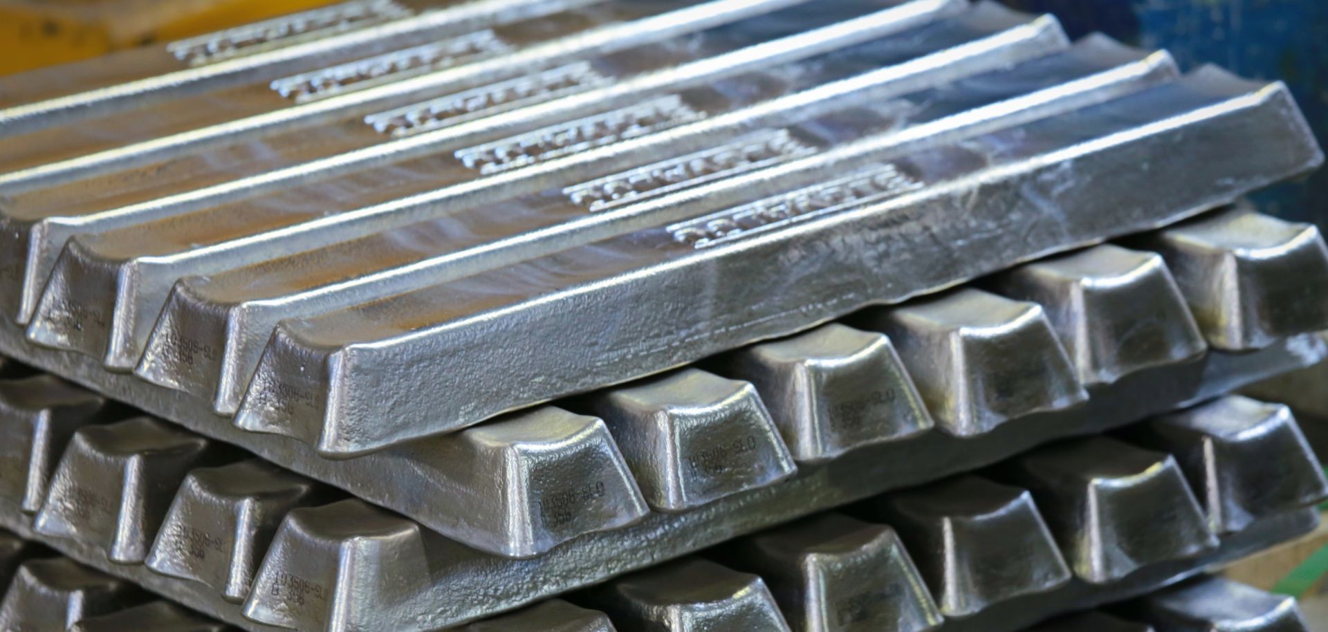 This photograph shows bars of aluminum.