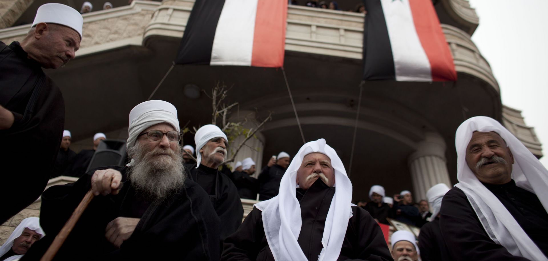 Druze men rally in support of the Syrian government in February 2012 in Majdal Shams, a Druze town on the Israeli-controlled side of the Golan Heights.