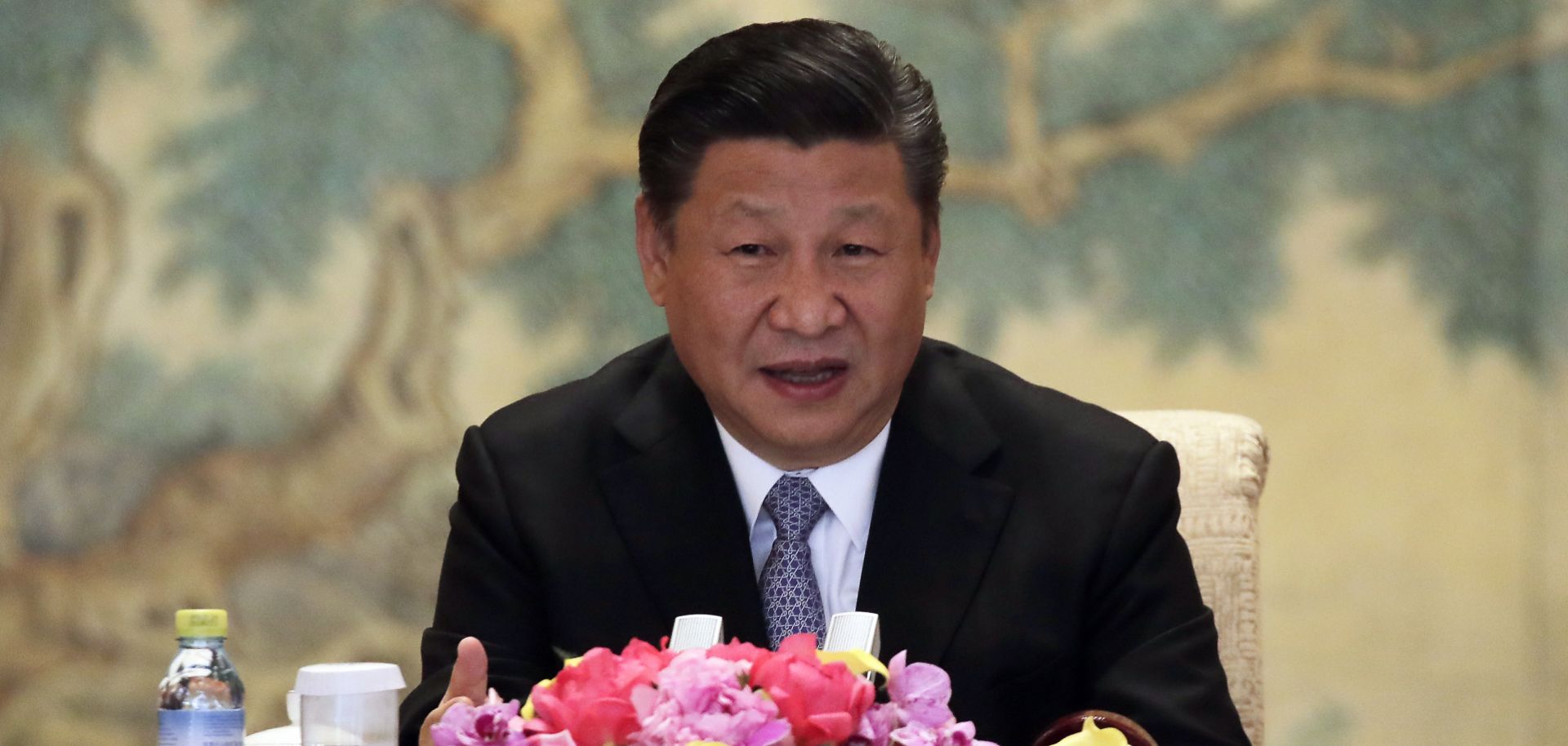Chinese President Xi Jinping delivers his opening remarks to the members of the global chief executive committee during the roundtable summit at the Diaoyutai State Guesthouse in Beijing, China, June 21. 