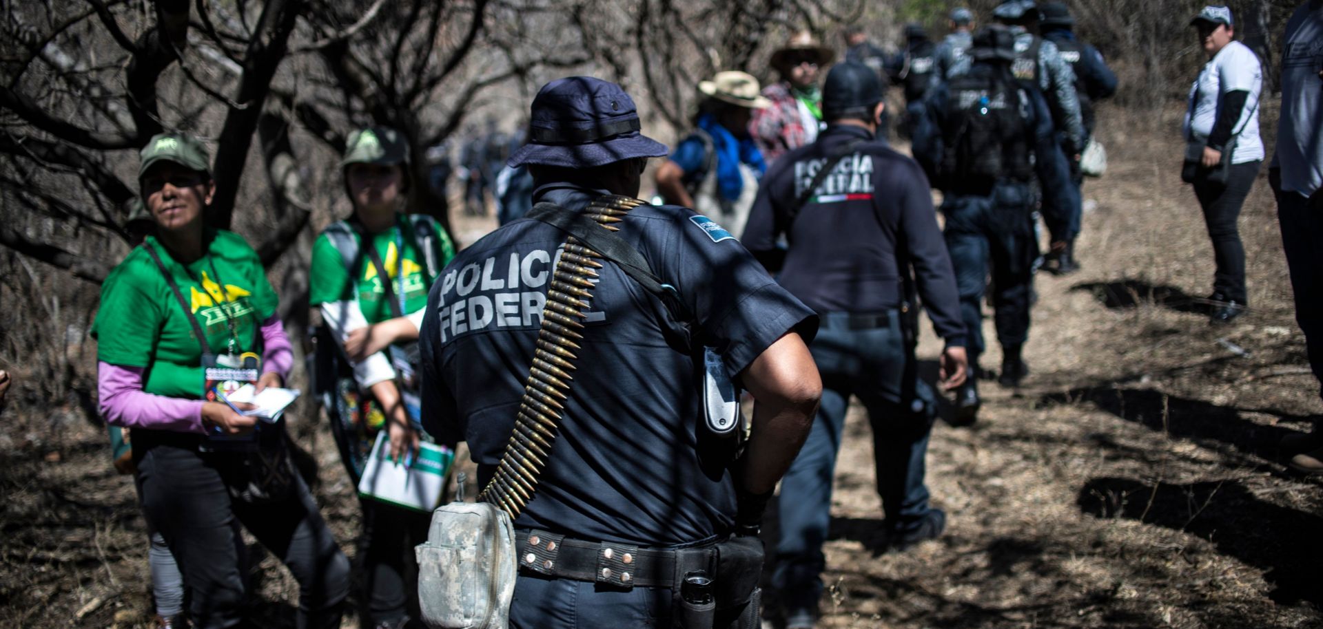 Mexican Federal Police officers participate in the fourth National Search Brigade for people who have gone missing in the drug war in Huitzuco de los Figueroa, Guerrero, on Jan. 21, 2019.