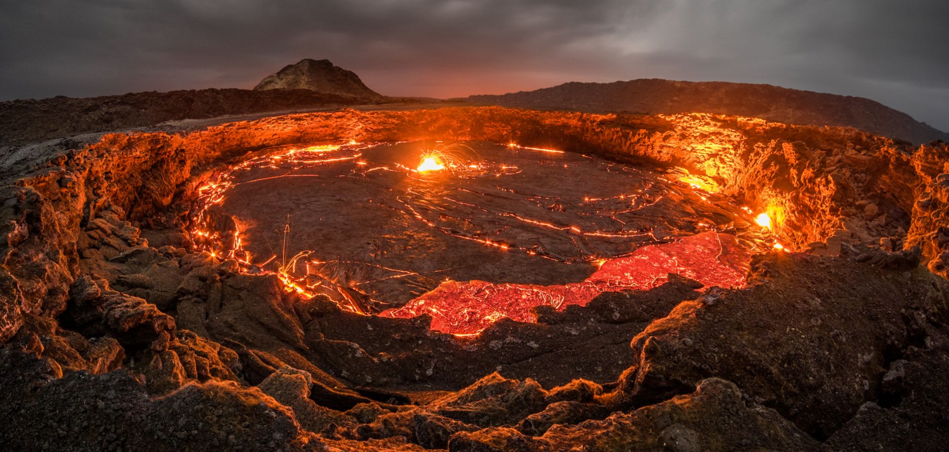 Lava rises to the top inside Erta Ale volcano in the Afar region of northeastern Ethiopia. The Ethiopian volcano is home to the world's oldest continuously active lava lake, known as the "Gateway To Hell."