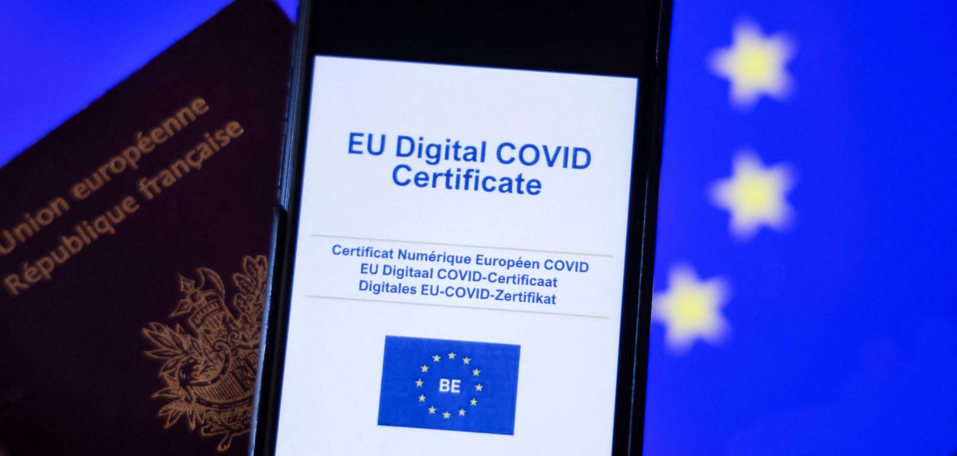 The European Union’s COVID-19 health certificate is seen on the screen of a phone in Brussels on June 16, 2021. 