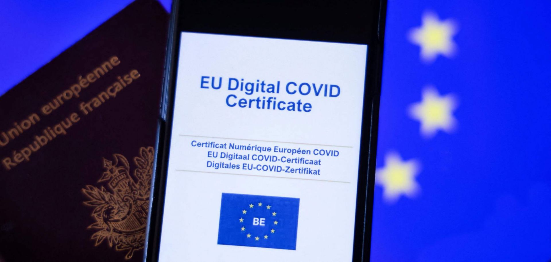 The European Union’s COVID-19 health certificate is seen on the screen of a phone in Brussels on June 16, 2021.