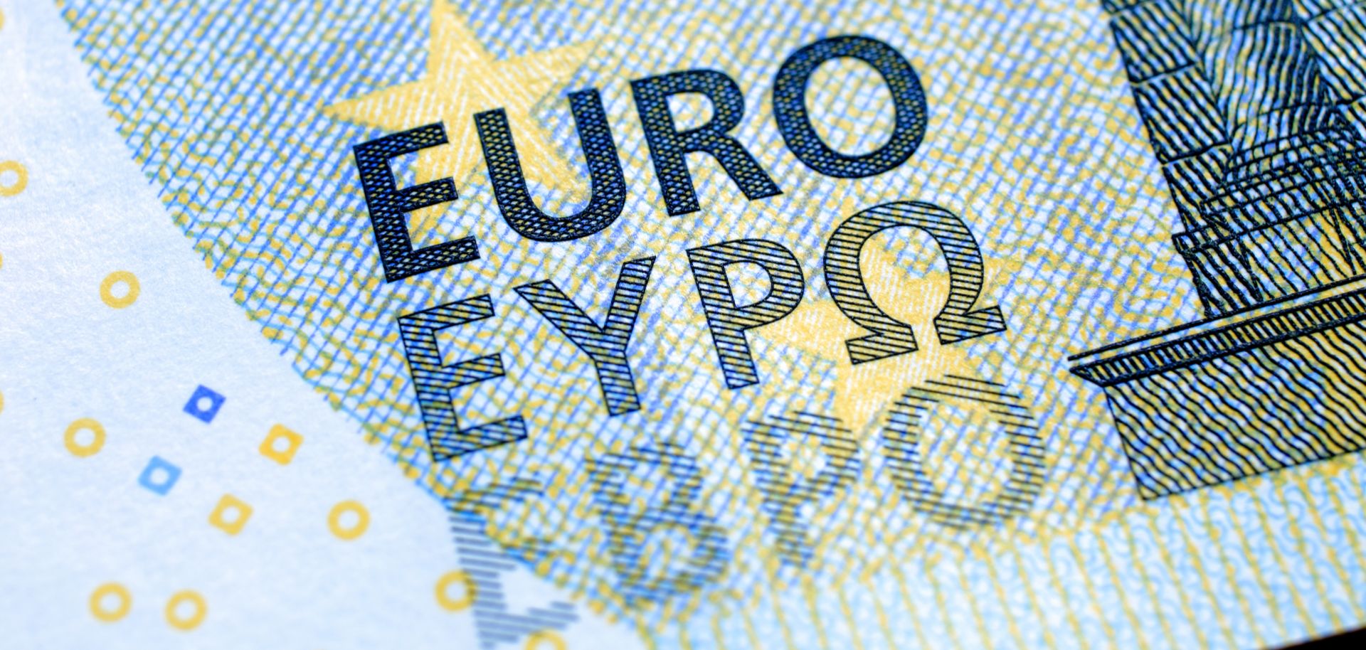 A close-up of a five-euro banknote. 