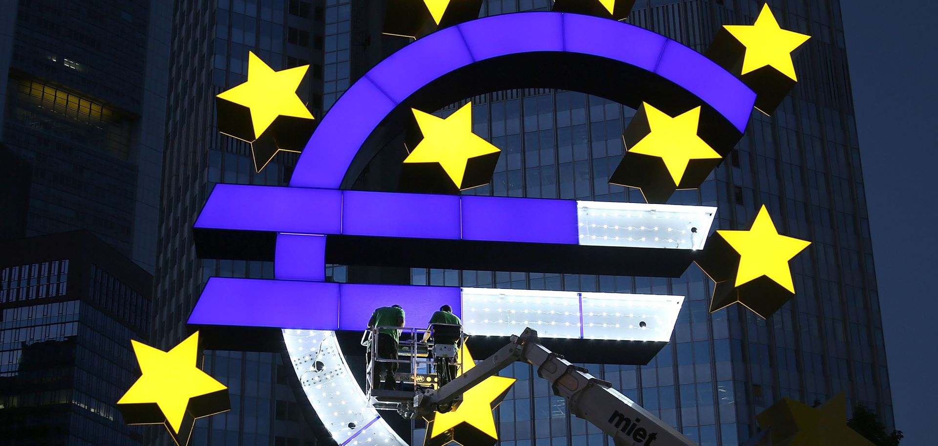 The Euro sculpture, built in 2001, undergoes restoration.