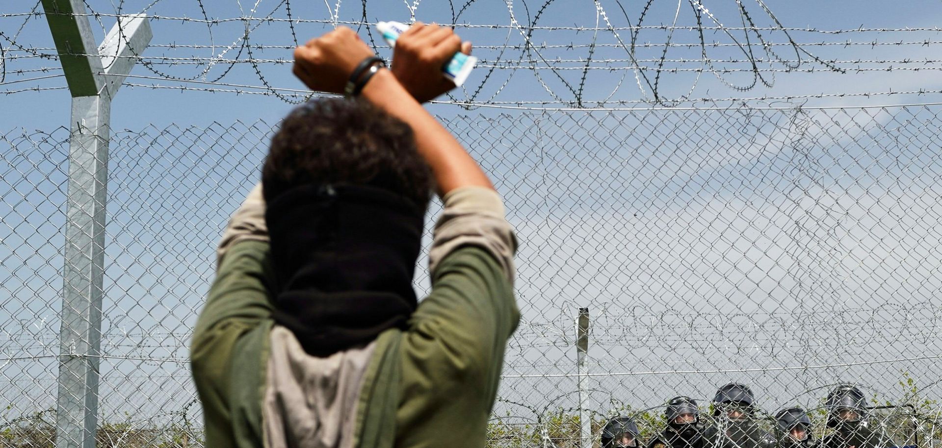 Refugees protest at the Greece-Macedonia border, calling for it to be reopened.
