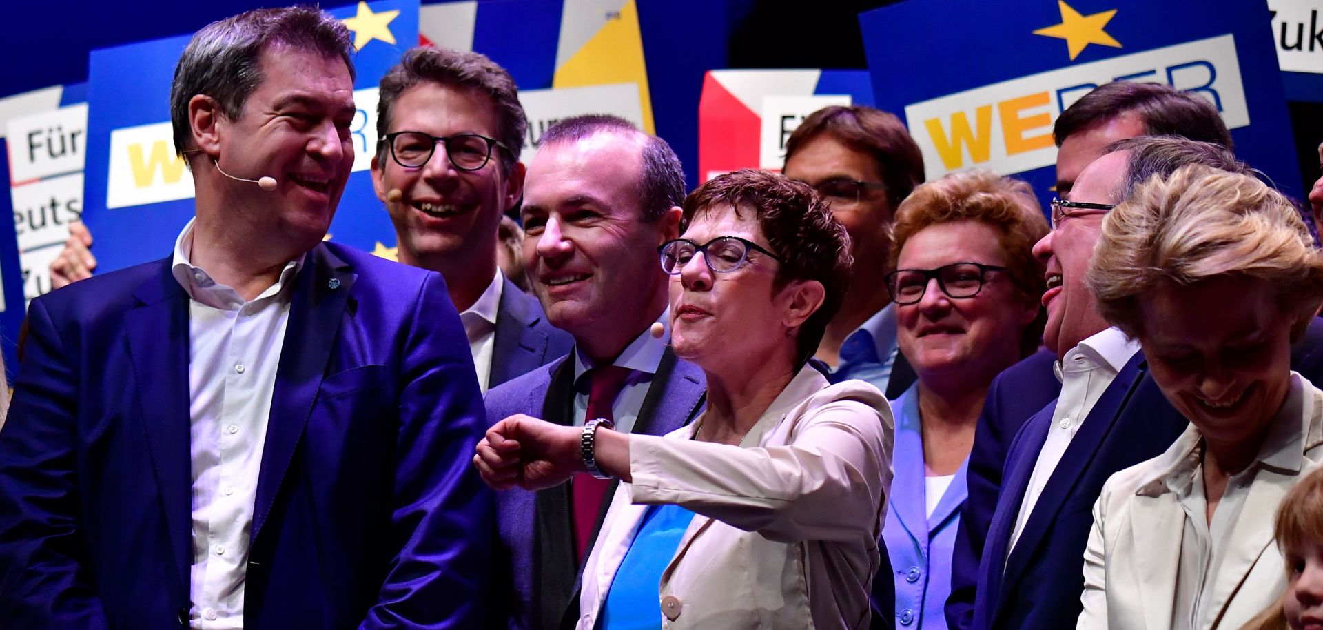 Members of Germany's ruling Christian Democratic Union (CDU) and Christian Social Union (CSU), including new CDU leader Annegret Kramp-Karrenbauer (C), launch the allied conservative parties' campaign for the European elections in an event in Muenster on April 27, 2019. 