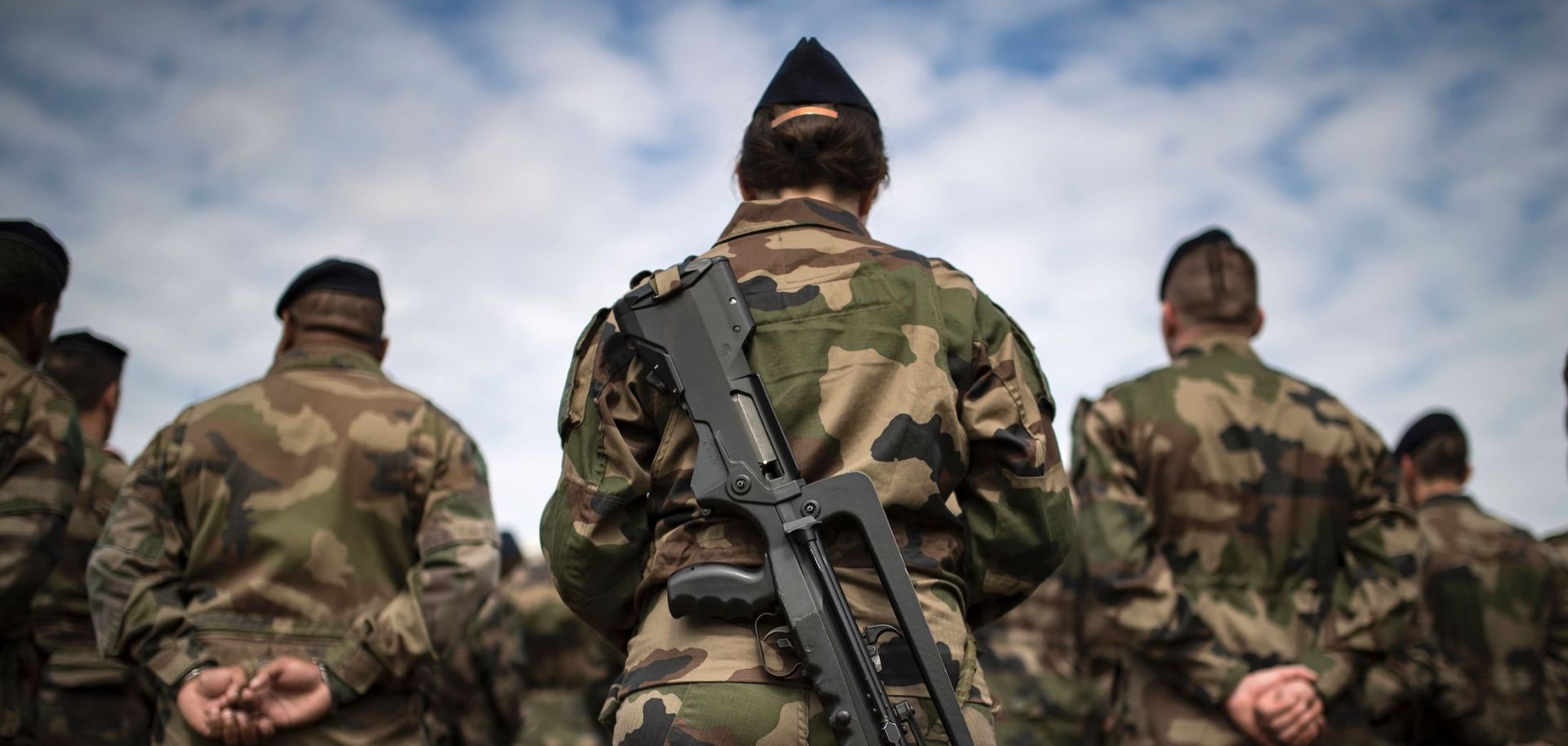 French soldiers at the fort of Vincennes, outside Paris, await a visit from their president and minister of defense in July 2016.