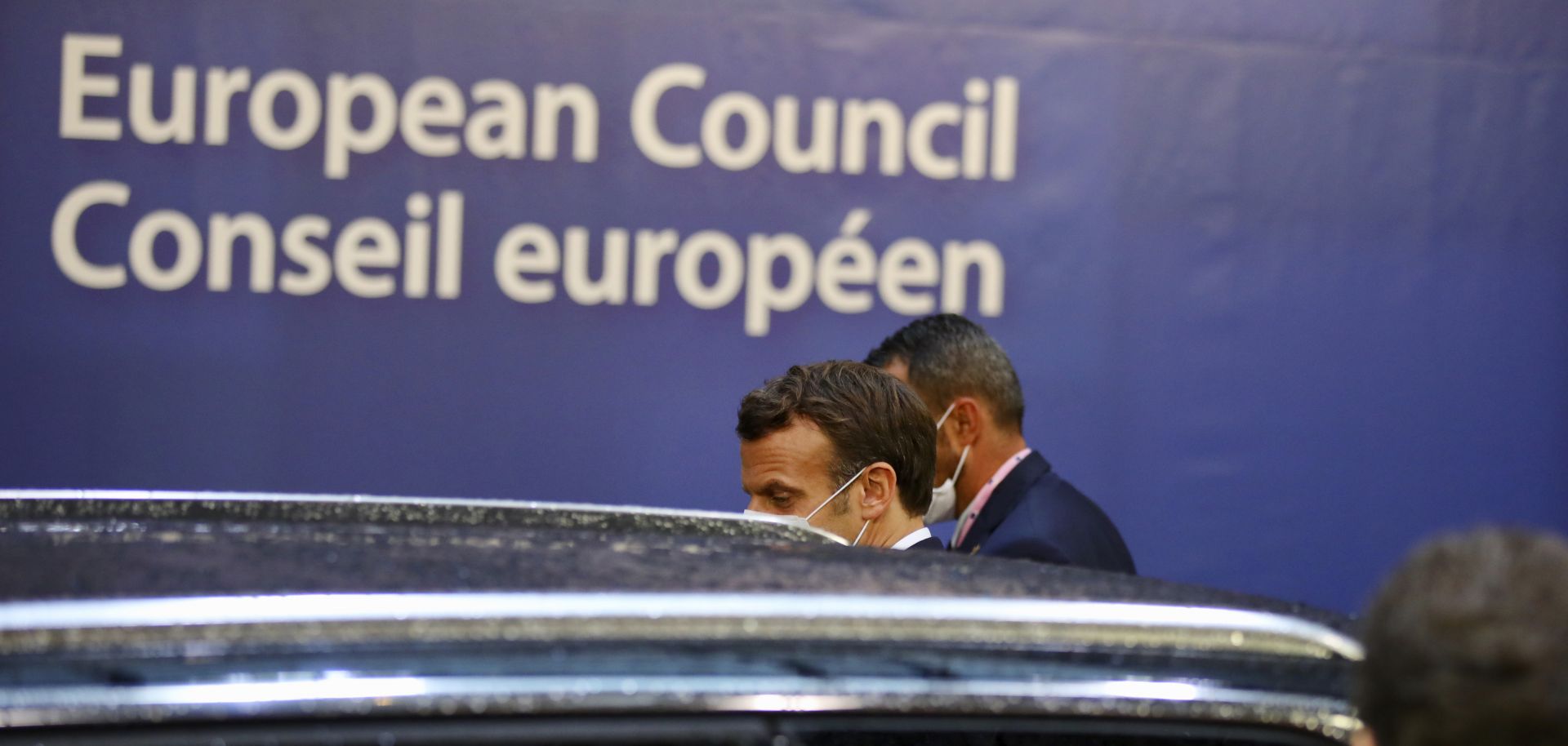 French President Emmanuel Macron leaves the European Council building in Brussels, Belgium, on July 20, 2020. Leaders from the 27 EU member states met on July 19 to discuss the bloc’s budget and new COVID-19 recovery package. 