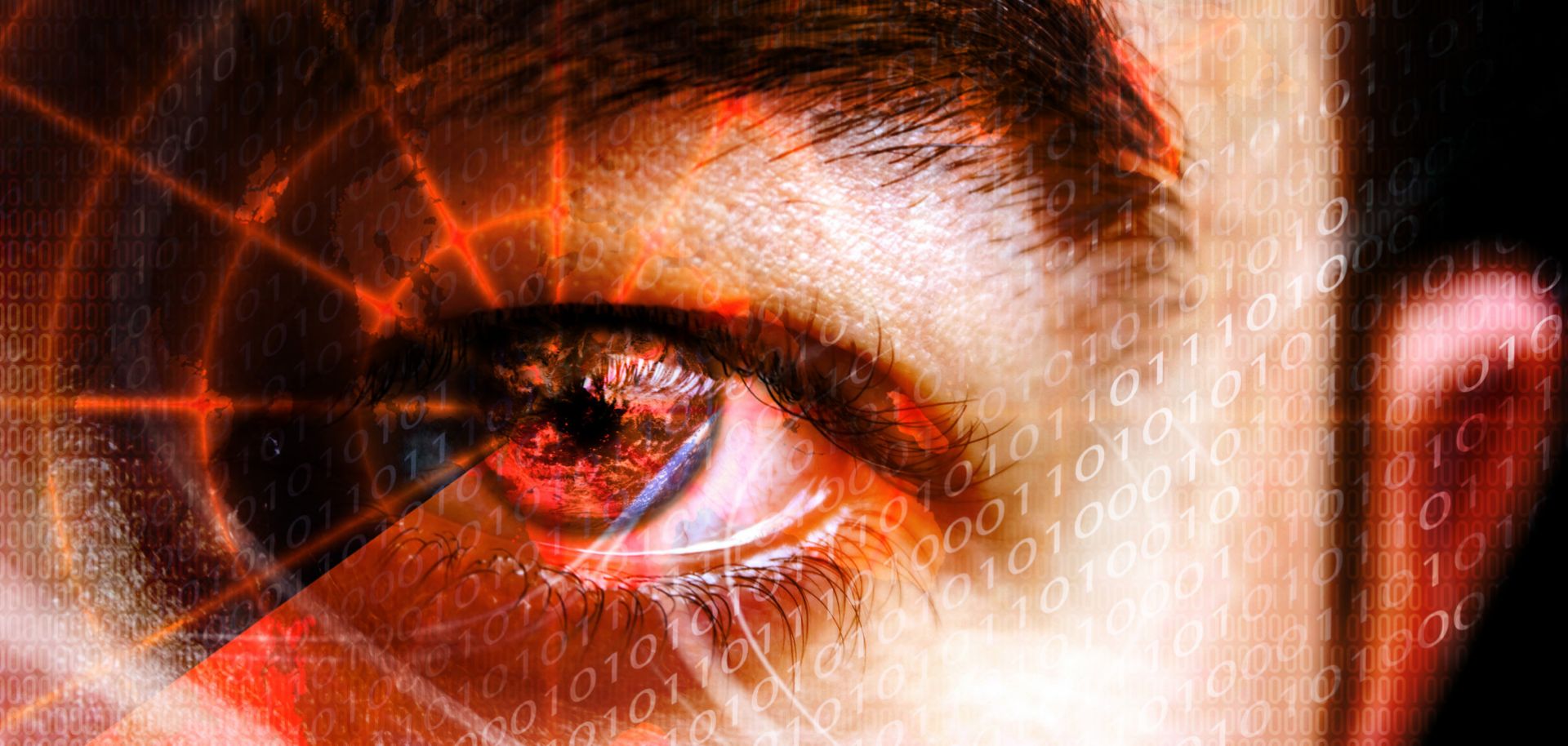 Abstract montage of a man's eye with a radar grid overlaying the pupil. 