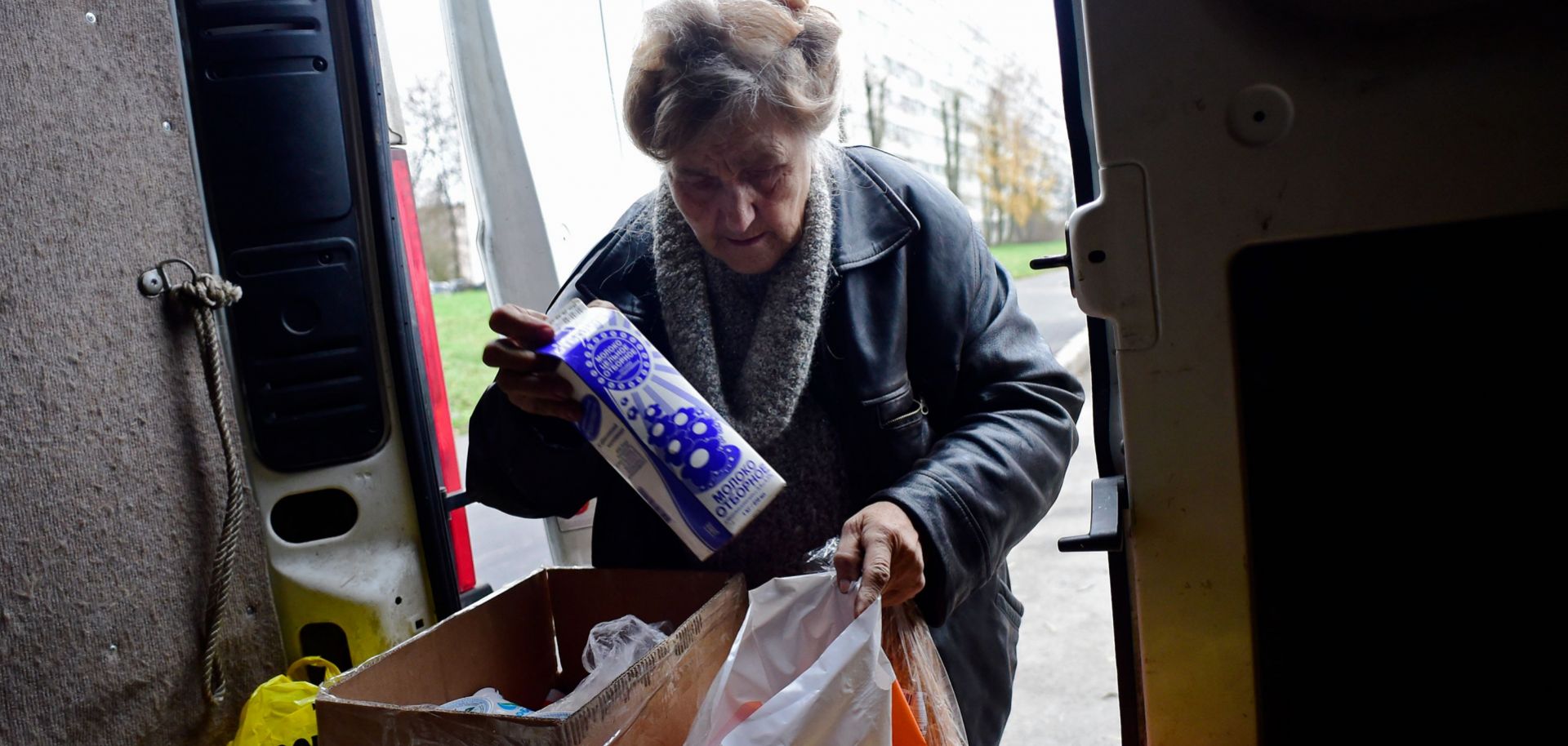 Galina Yakovleva, 80, assembles food for pensioners in Saint Petersburg, Russia, on November 7, 2018.