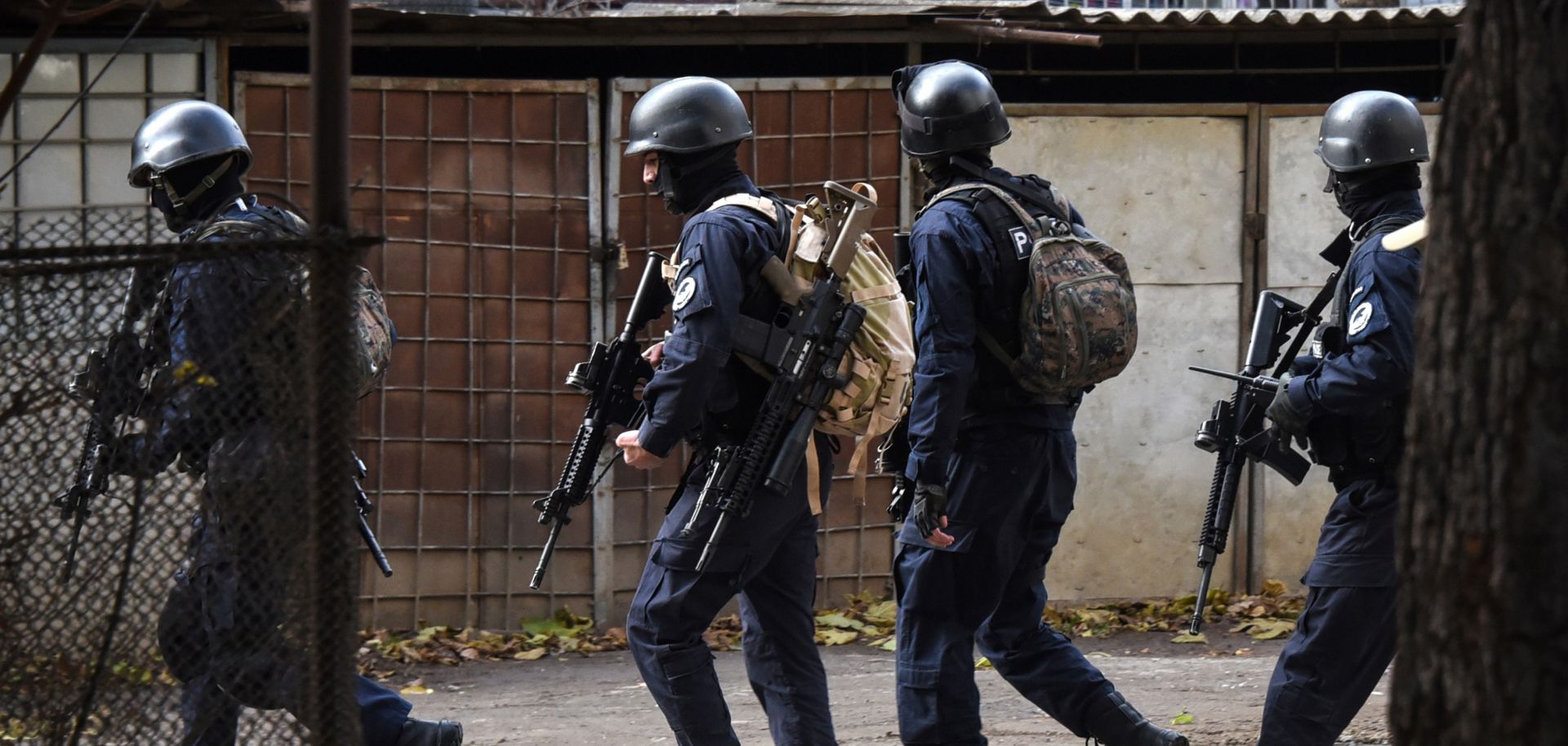 Counterterrorism forces surround an apartment building in the Isani district of Georgia's capital city, Tbilisi, during a raid Nov. 22.