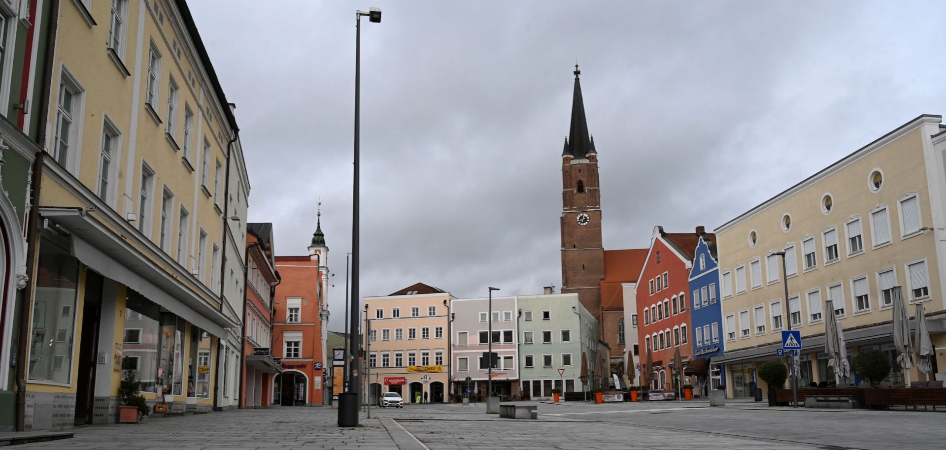 A photo shows an empty plaza with closed stores in the German city of Eggenfelden on Oct. 27, 2020, after a local lockdown was imposed to contain the spread of COVID-19. 