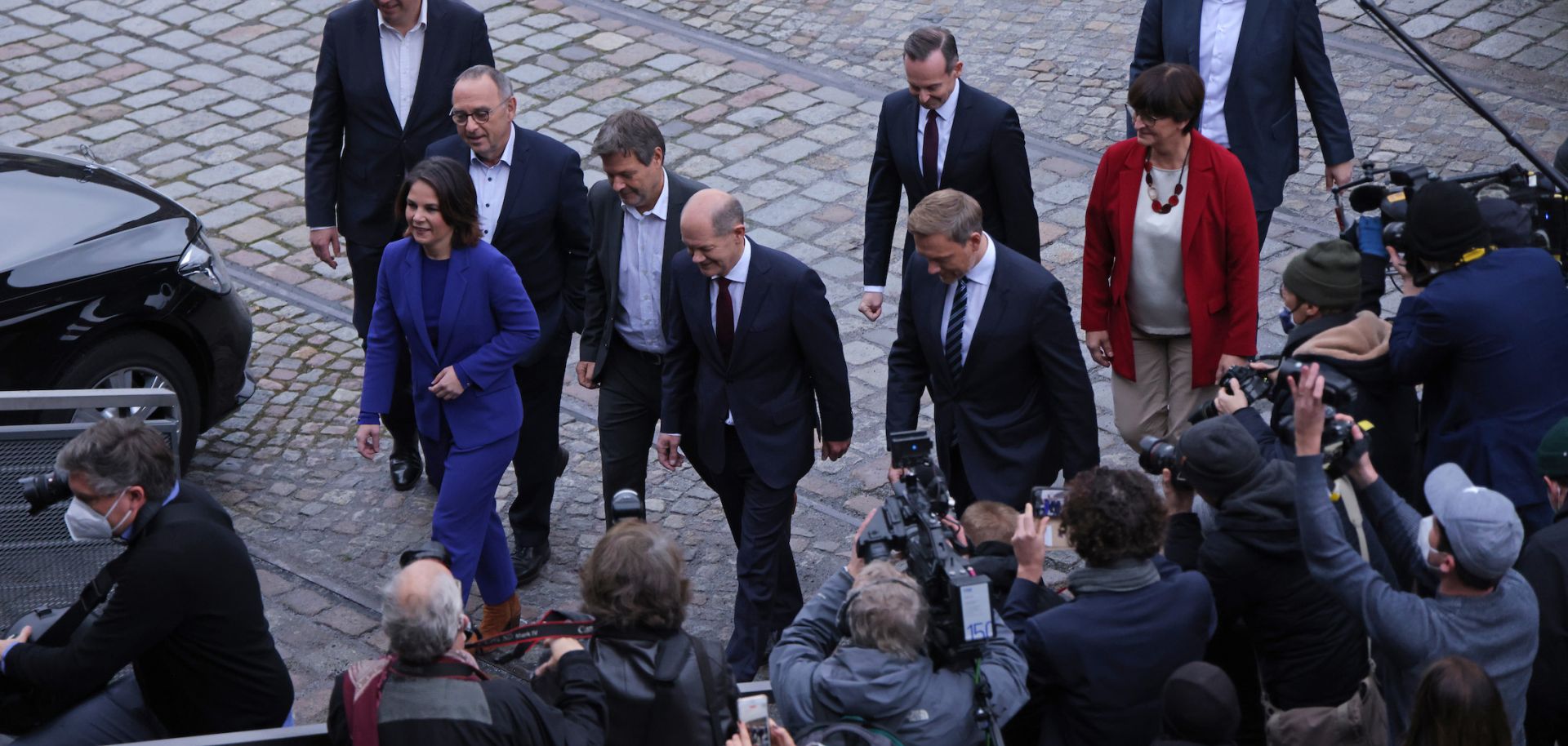 Leading members of the German Social Democrats, the Greens Party and the German Free Democrats arrive to present their mutually-agreed on coalition contract on November 24, 2021 in Berlin.