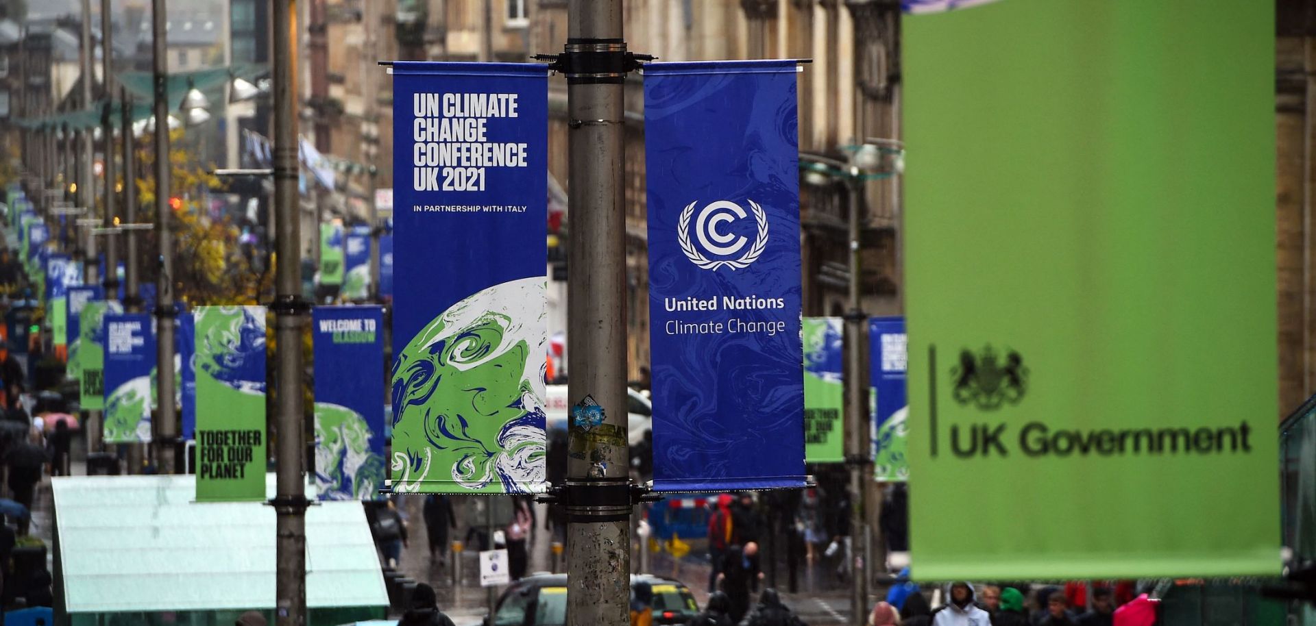 COP26 banners hang from lamp posts Oct. 29, 2021, in Glasgow, Scotland ahead of the start of the climate summit.