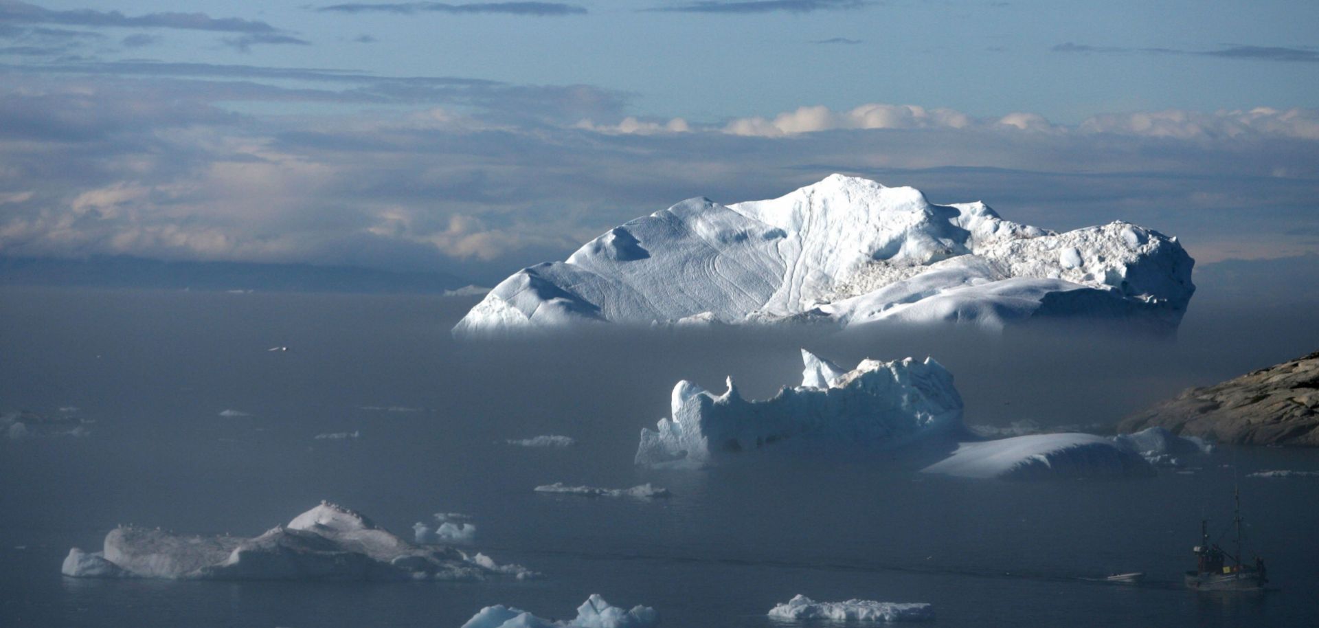 Icebergs float in the Jacobshavn Bay near the town of Ilulissat, Greenland. 