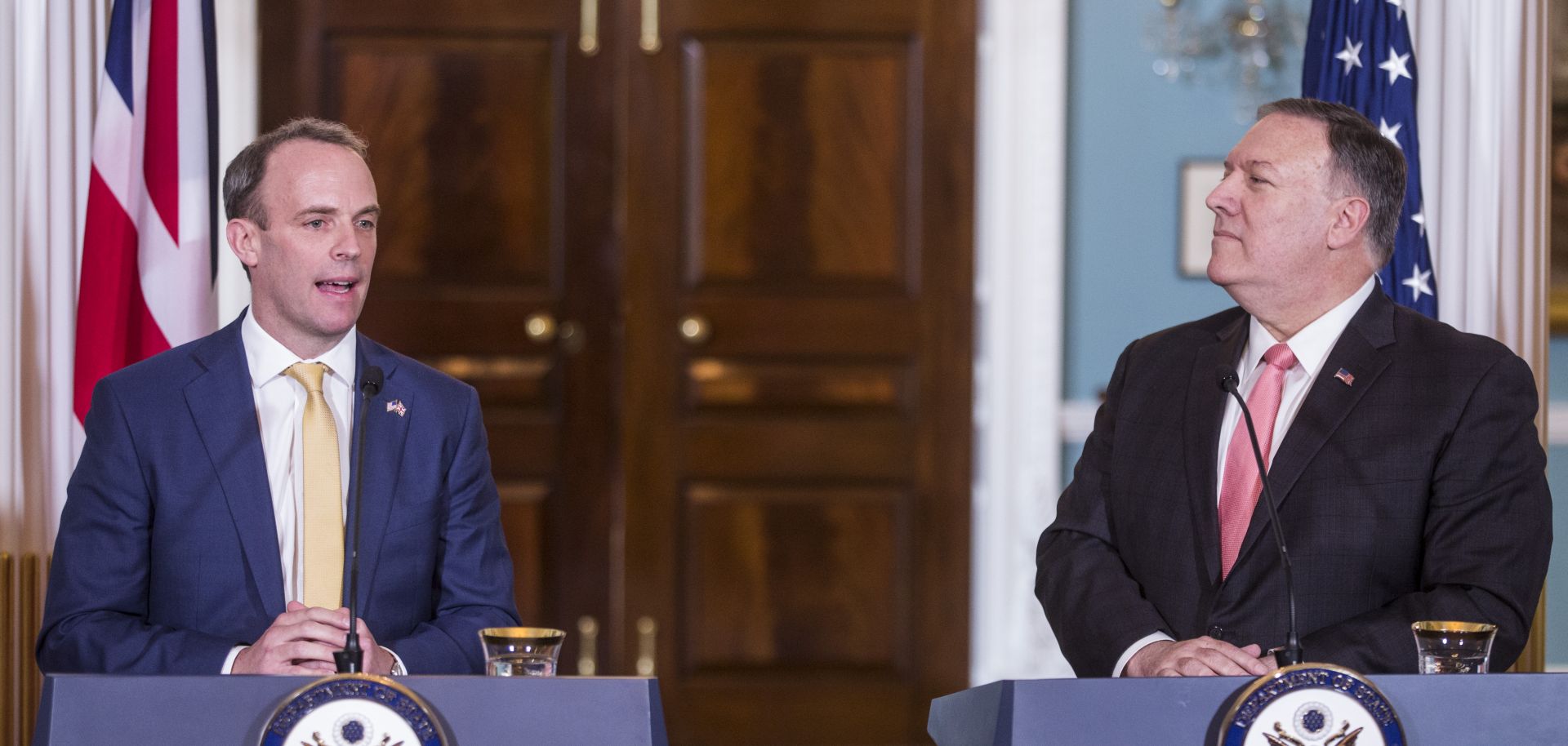 British Foreign Secretary Dominic Raab speaks with U.S. Secretary of State Mike Pompeo.