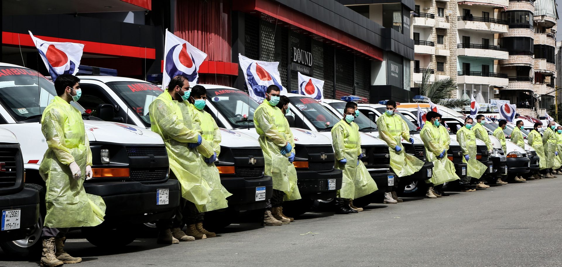 Members of Hezbollah’s medical apparatus wear full protective gear in Beirut, Lebanon, to demonstrate their readiness for the COVID-19 fight on March 31, 2020. 