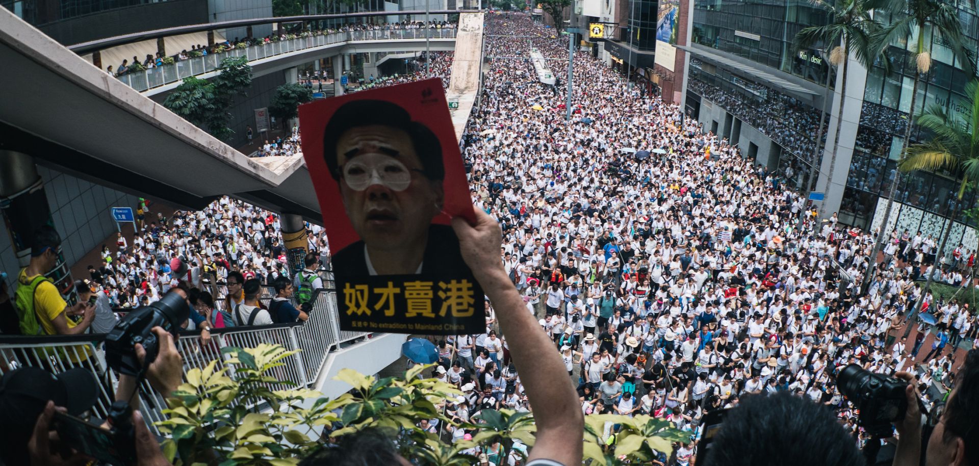 People in Hong Kong join a mass protest against the government's controversial extradition law on June 9, 2019.