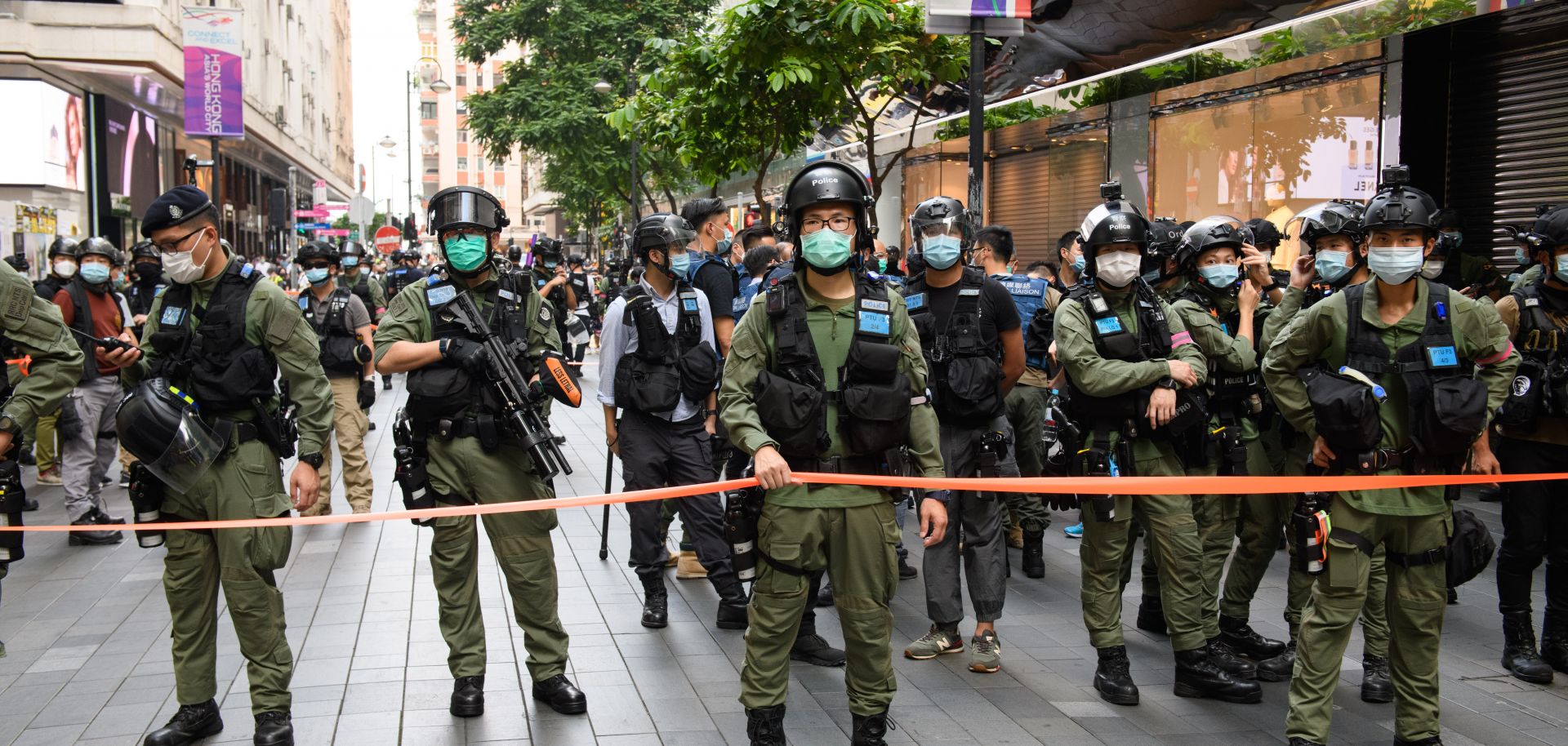 Police cordon off an area during a protest on China's National Day in Hong Kong on Oct. 1, 2020. 