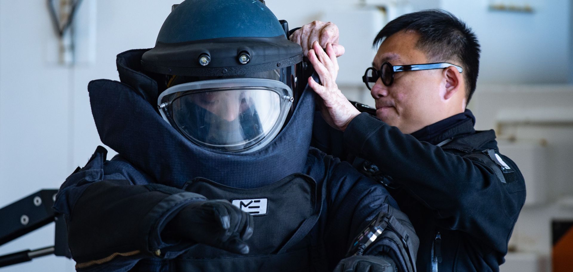 A police officer wears a bomb suit during a Dec. 6 event hosted by the Hong Kong Police Department's Explosive Ordnance Disposal Bureau (EOD).