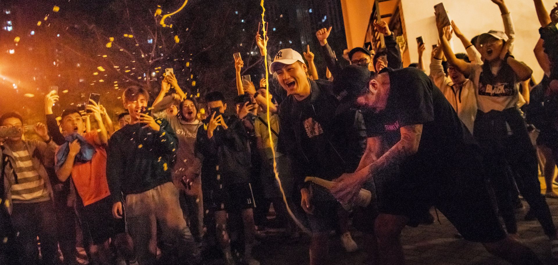 Hong Kong residents celebrate the results of local council elections on Nov. 25.