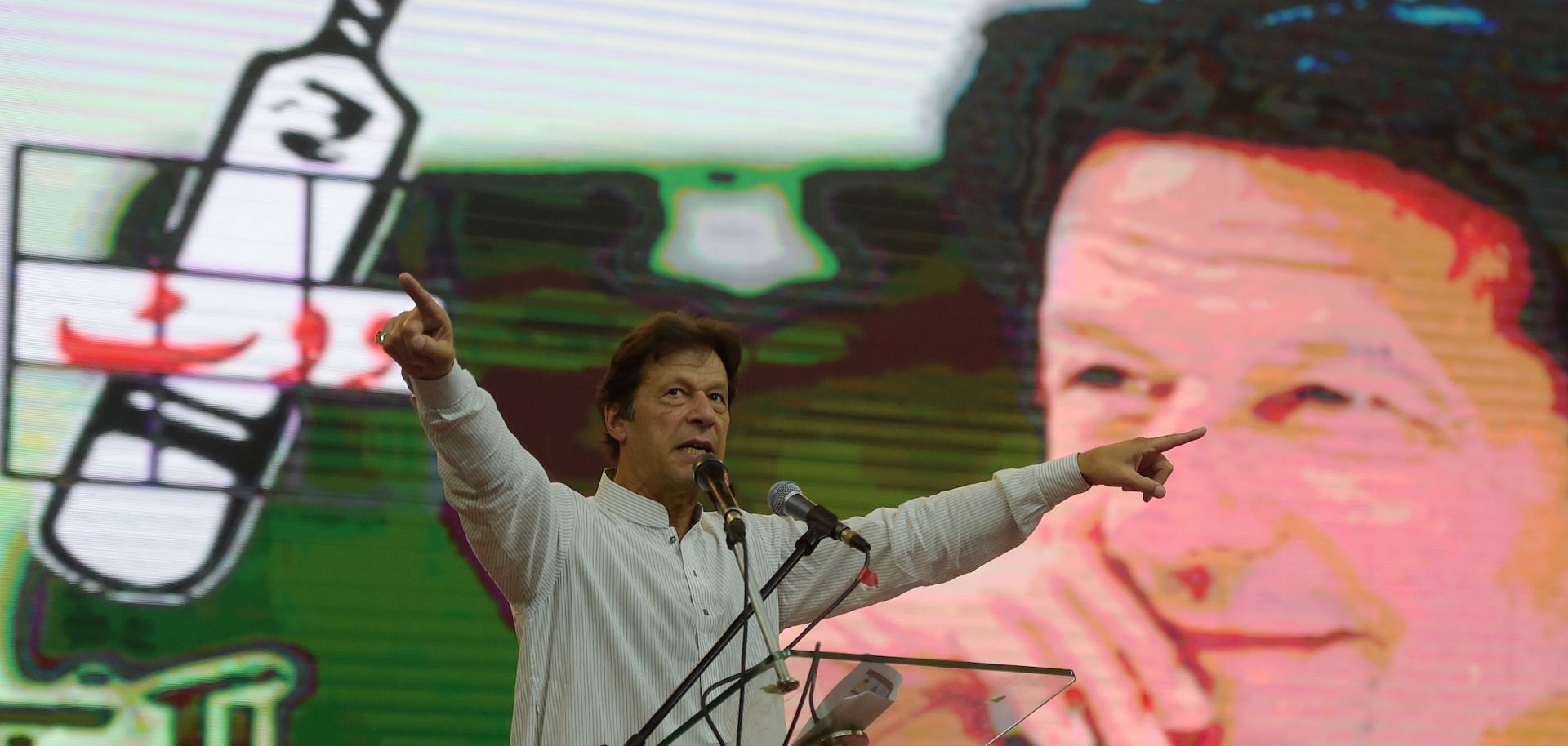 Imran Khan, a former cricketer and leader of the Pakistan Tehreek-e-Insaf party, rallies supporters during a campaign event June 30, 2018, less than a month before his election as Pakistan's new prime minister.
