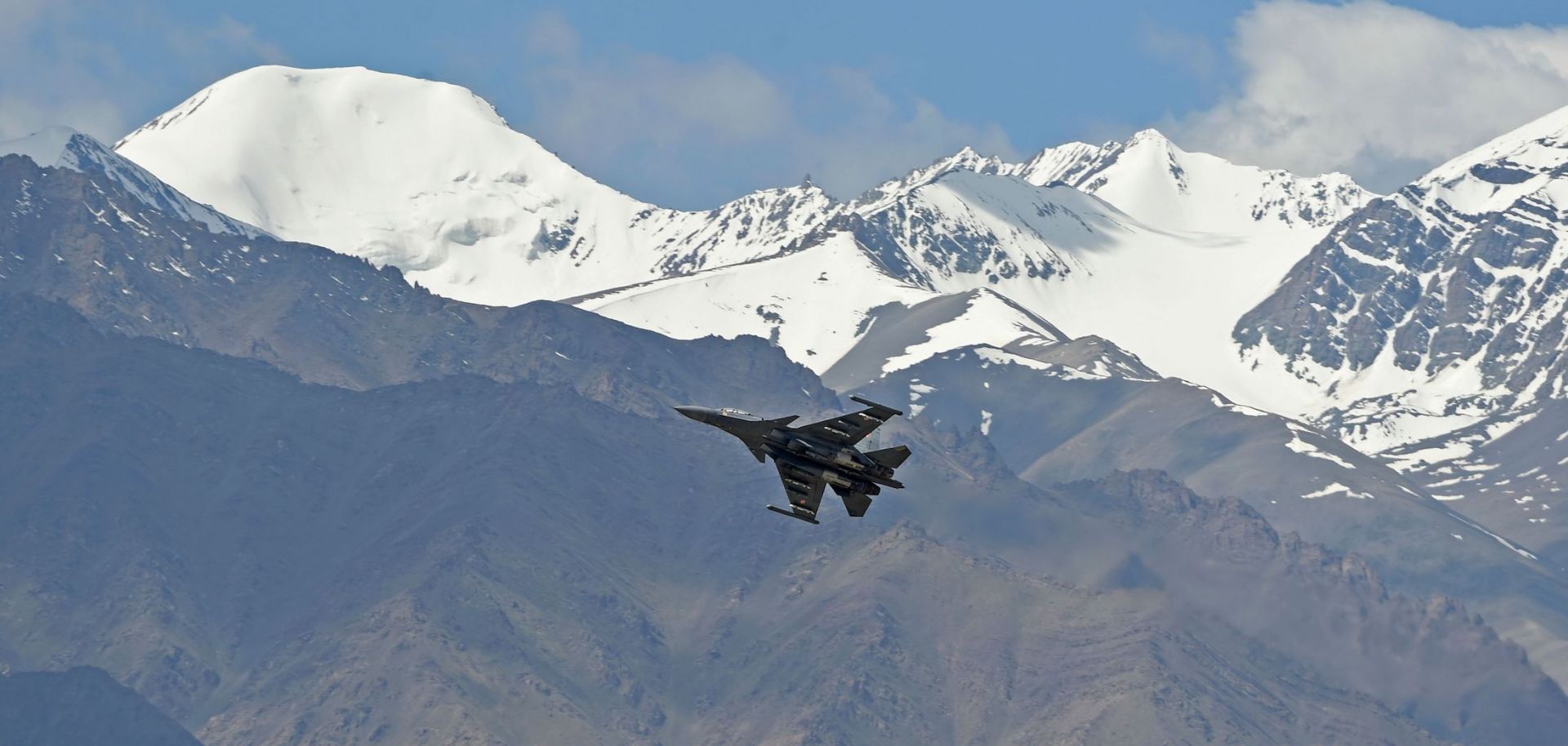 An Indian fighter jet flies over Leh, the joint capital of the union territory of Ladakh, on June 26, 2020.