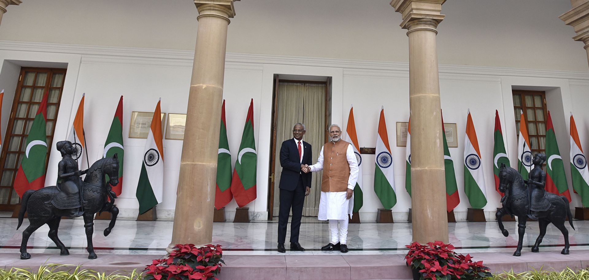 Indian Prime Minister Narendra Modi and Maldivian President Ibrahim Mohamed Solih shake hands before a meeting on Dec. 17, 2018, in New Delhi.
