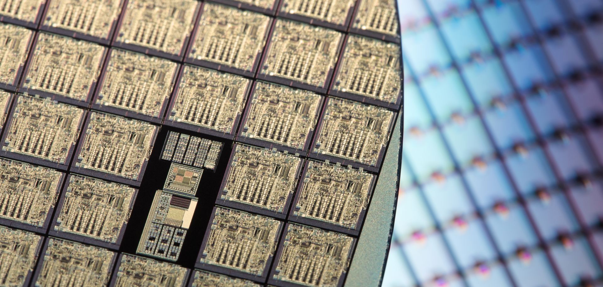 An image displays rows of silicon wafers.