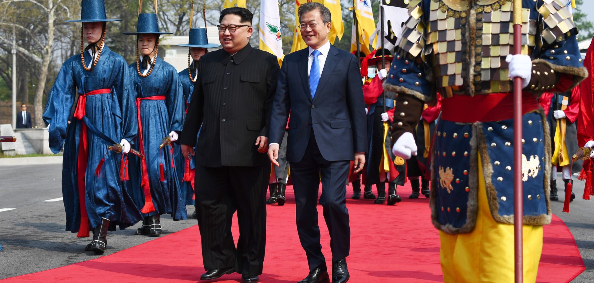 In this photograph, North Korean leader Kim Jong Un, left, and South Korean President Moon Jae In walk together on April 27, 2018, after meeting in Panmunjom for the first inter-Korean summit since 2007.
