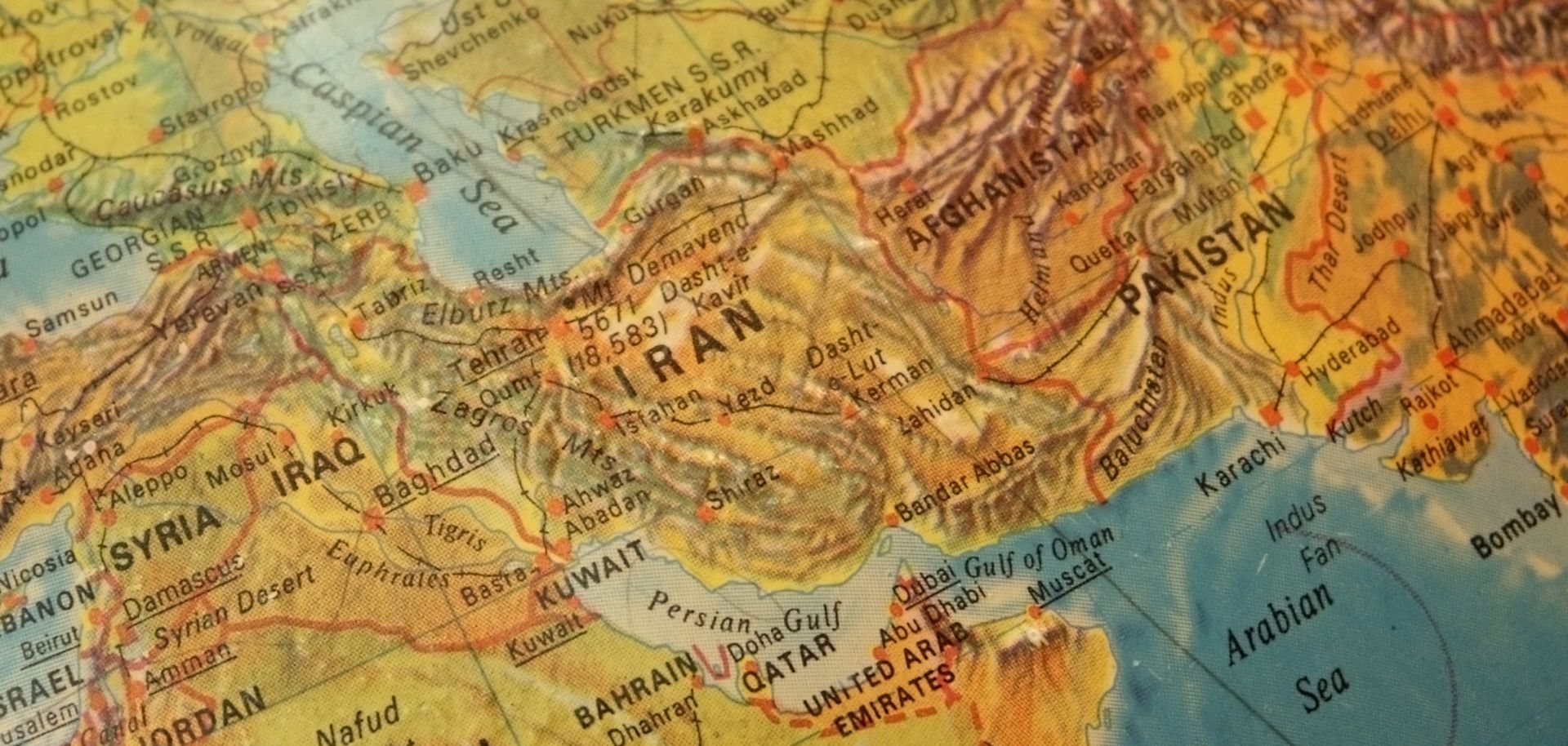 A vintage map shows the Middle East, including Iran.