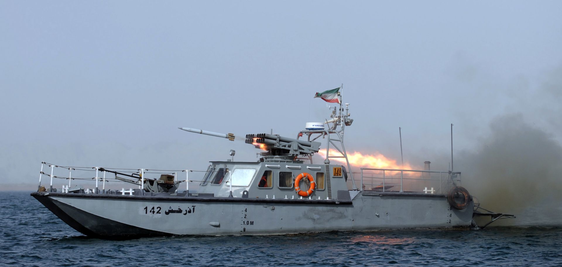 An Iranian war-boat fires a missile during the "Velayat-90" navy exercises in the Strait of Hormuz in southern Iran.