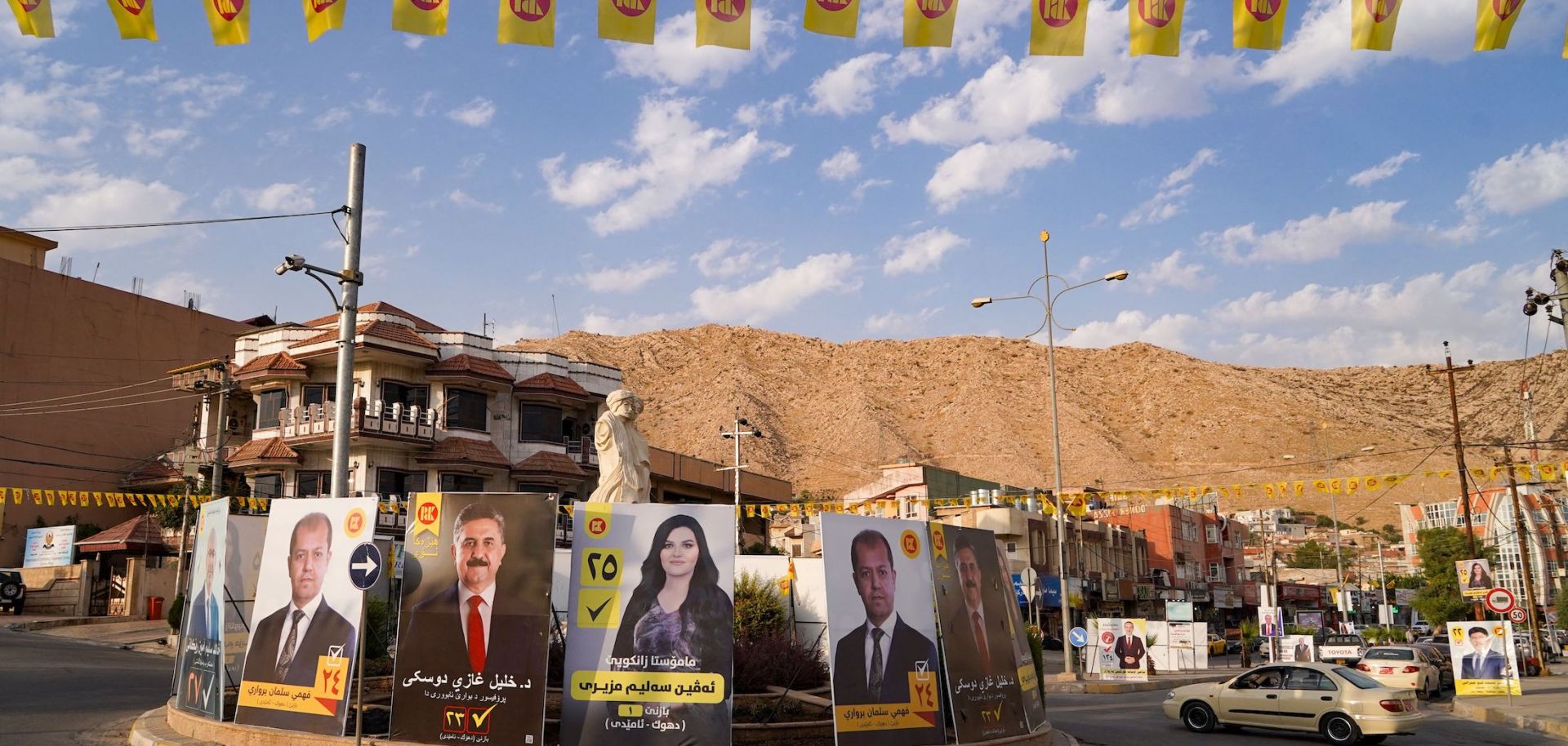 Electoral posters on Oct. 3, 2021, in the northern Iraqi city of Dohuk in the autonomous Kurdish region ahead of the upcoming parliamentary elections.