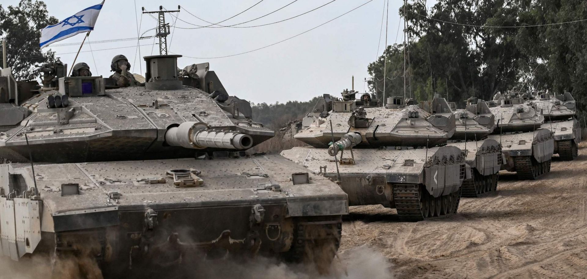 Israeli army Merkava battle tanks deploy Oct. 13, 2023, with the Gaza Strip in southern Israel. 