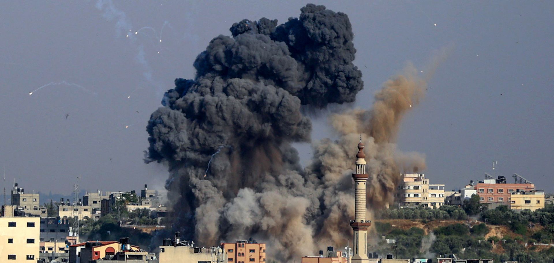 Smoke billows from Israeli airstrikes in Hamas-controlled Gaza City on May 11, 2021. 