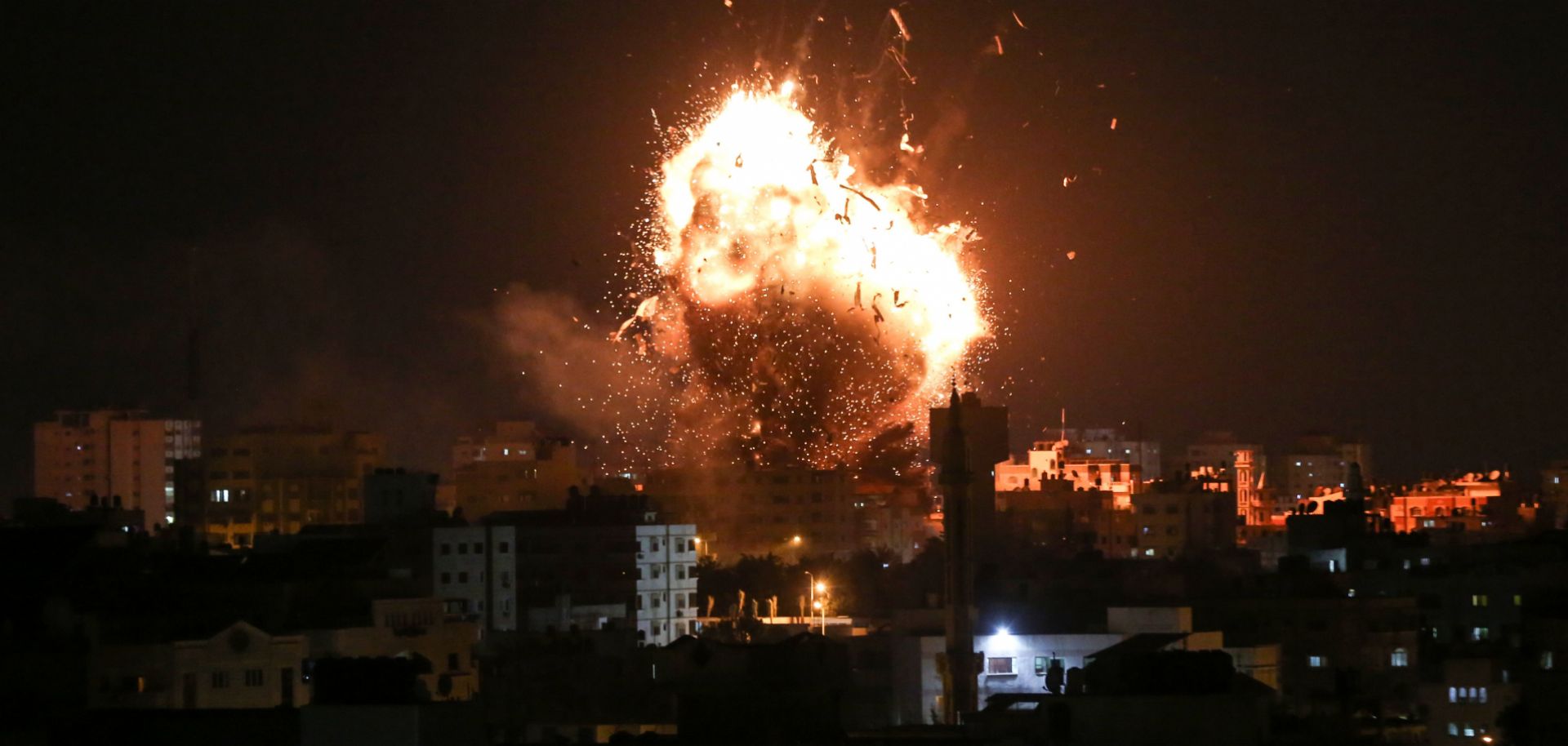 An Israeli airstrike hits the Hamas-run Al-Aqsa TV station in the Gaza Strip on Nov. 12, 2018.