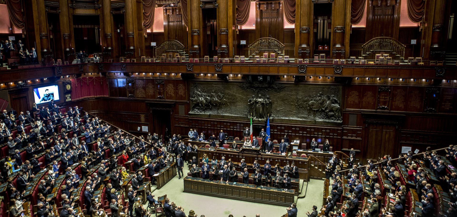 Ukrainian President Volodymyr Zelensky addresses the Italian Parliament via live video from the embattled city of Kyiv