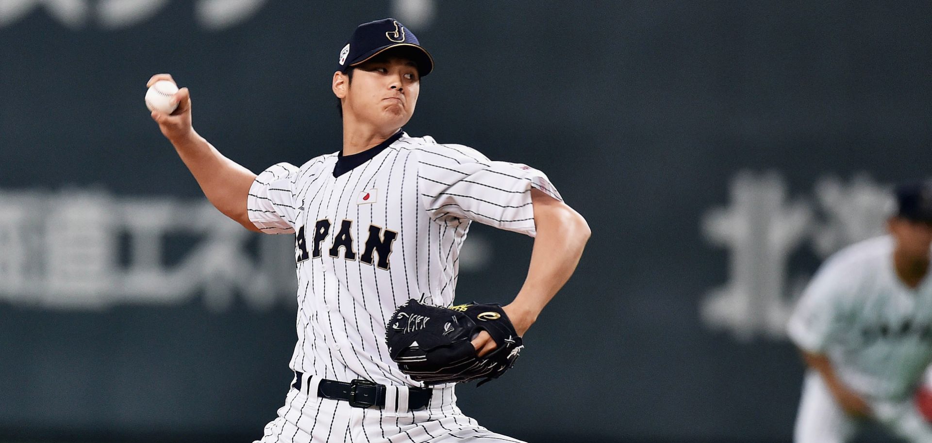 Japanese baseball player Shohei Otani has shown prowess both as a pitcher and as a power hitter, drawing interest by Major League Baseball teams.