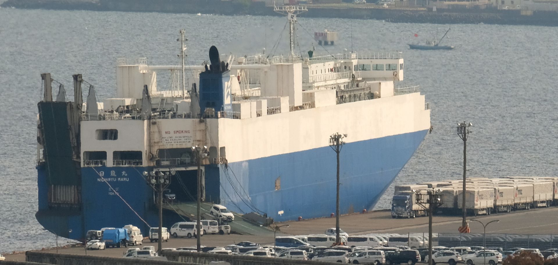 A car transport ship sits at anchor at the Nissan Motor's Oppama plant in Yokosuka, Japan, on Nov. 26, 2018.