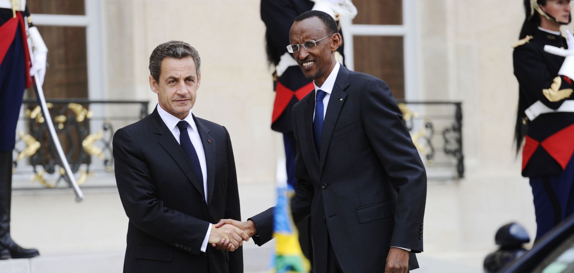 Rwandan President Paul Kagame visited France for the first time since the 1994 Rwandan genocide in September 2011. Here, then-French President Nicolas Sarkozy welcomes Kagame to the Elysee Palace.