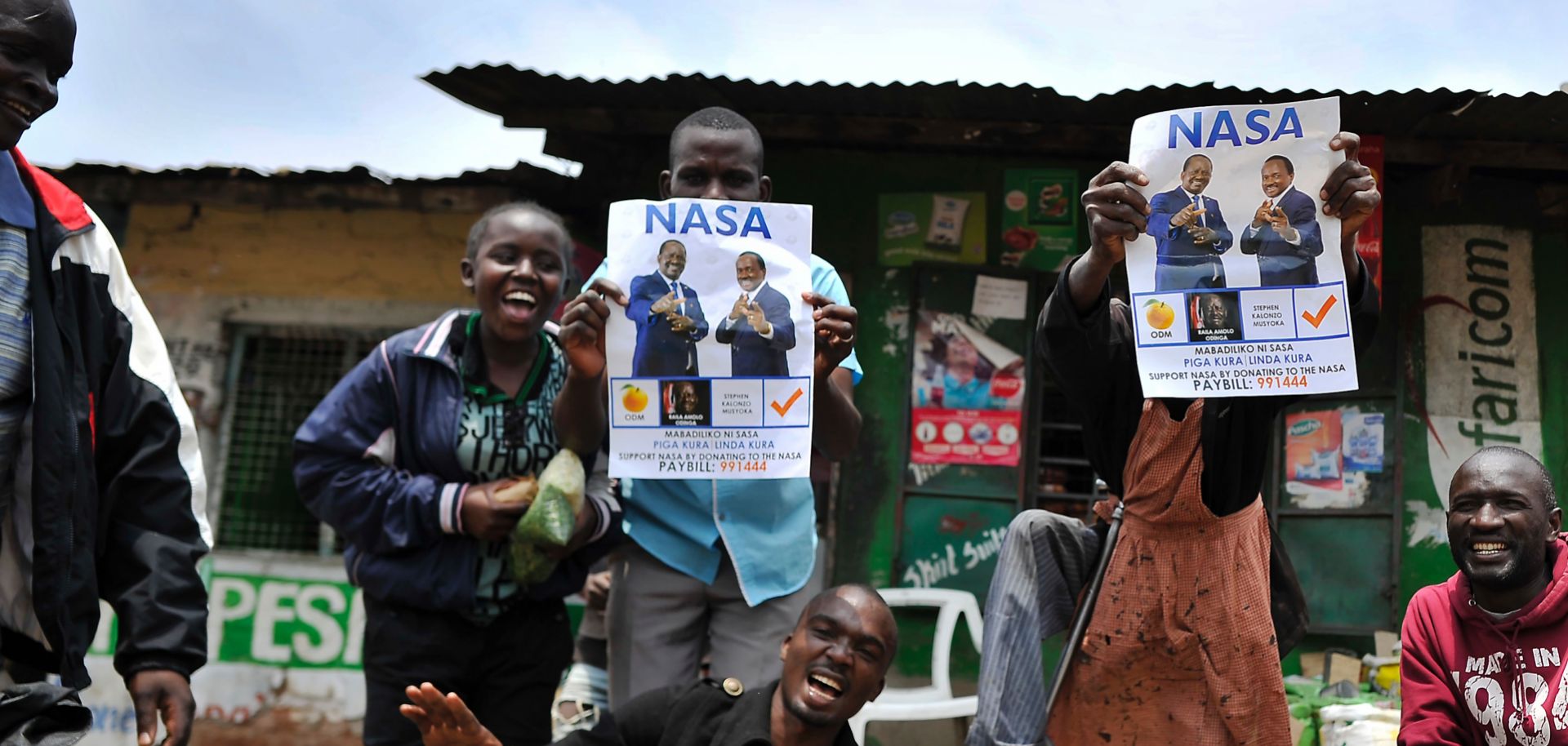 Supporters of Kenyan opposition National Super Alliance (NASA) leader Raila Odinga celebrate in the streets of the Mathare slum in Nairobi on Sept. 1.