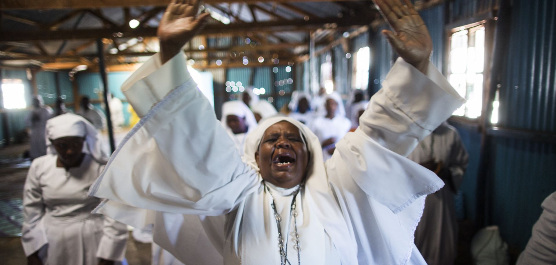 Kenyans pray as they hold a church service in Nairobi for the victims of the Westgate Shopping Centre attack, Sept. 29, 2013. 