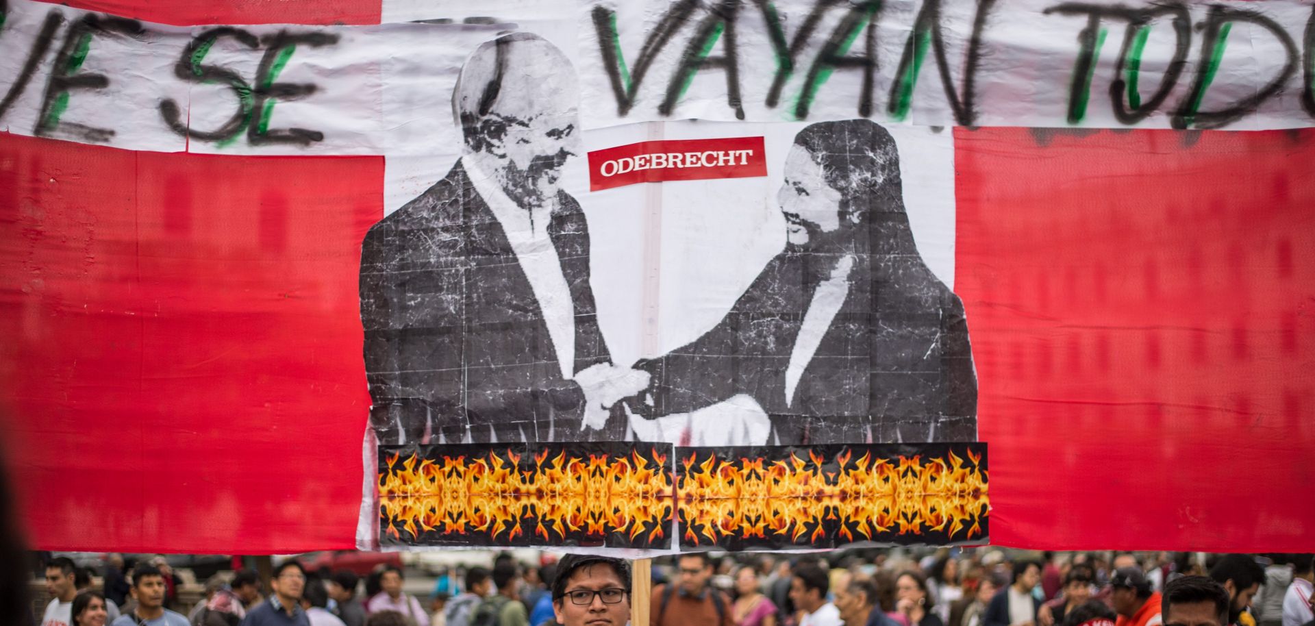 People protest against corruption in Lima, Peru, on Dec. 16, 2017, as the presidency of Pedro Pablo Kuczynski hangs in the balance while the opposition, which controls Congress, demands he steps down or face impeachment over graft allegations linked to Brazilian construction company Odebrecht.